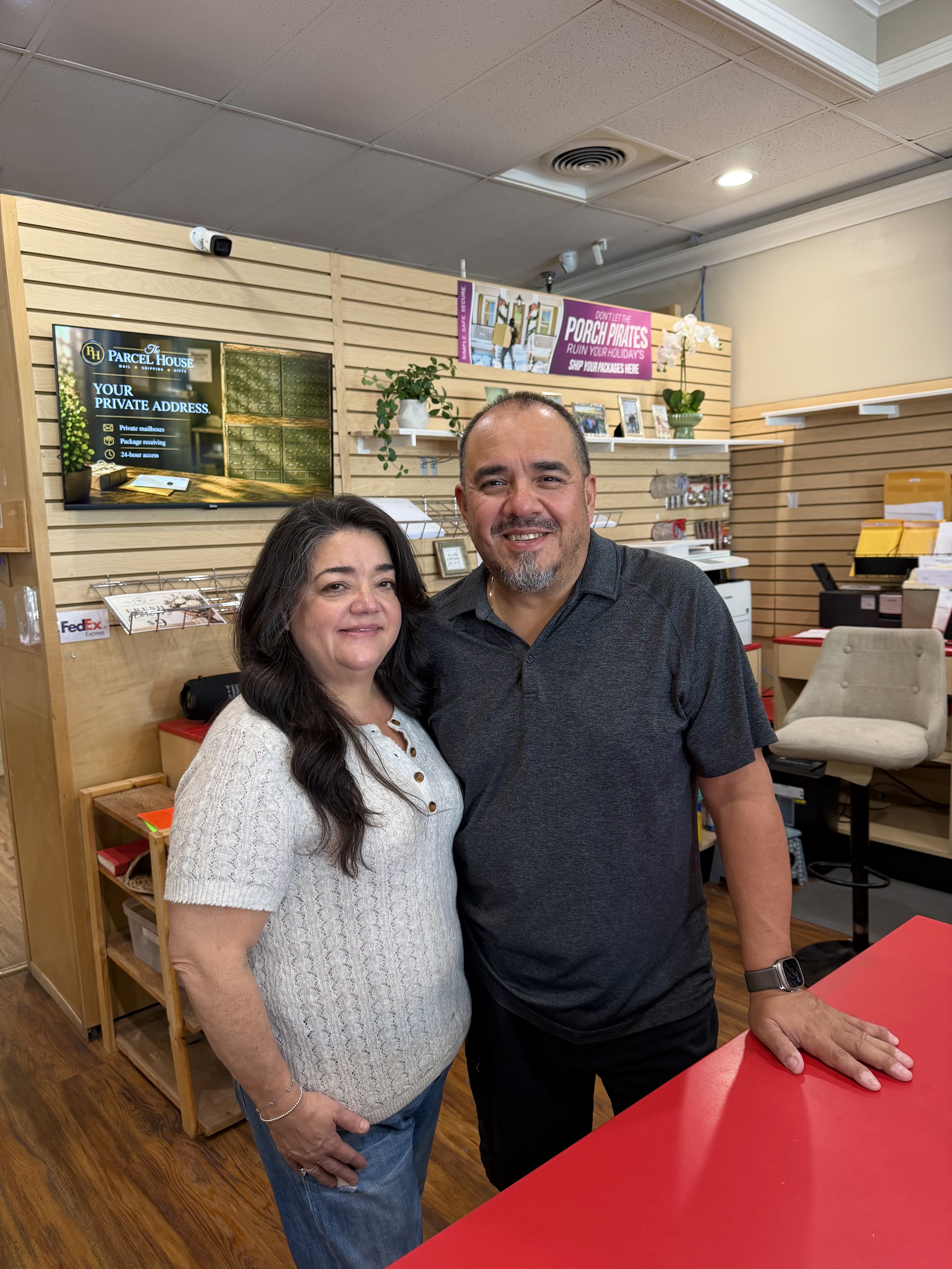 Sam and Stacy Diaz behind the counter at The Parcel House.